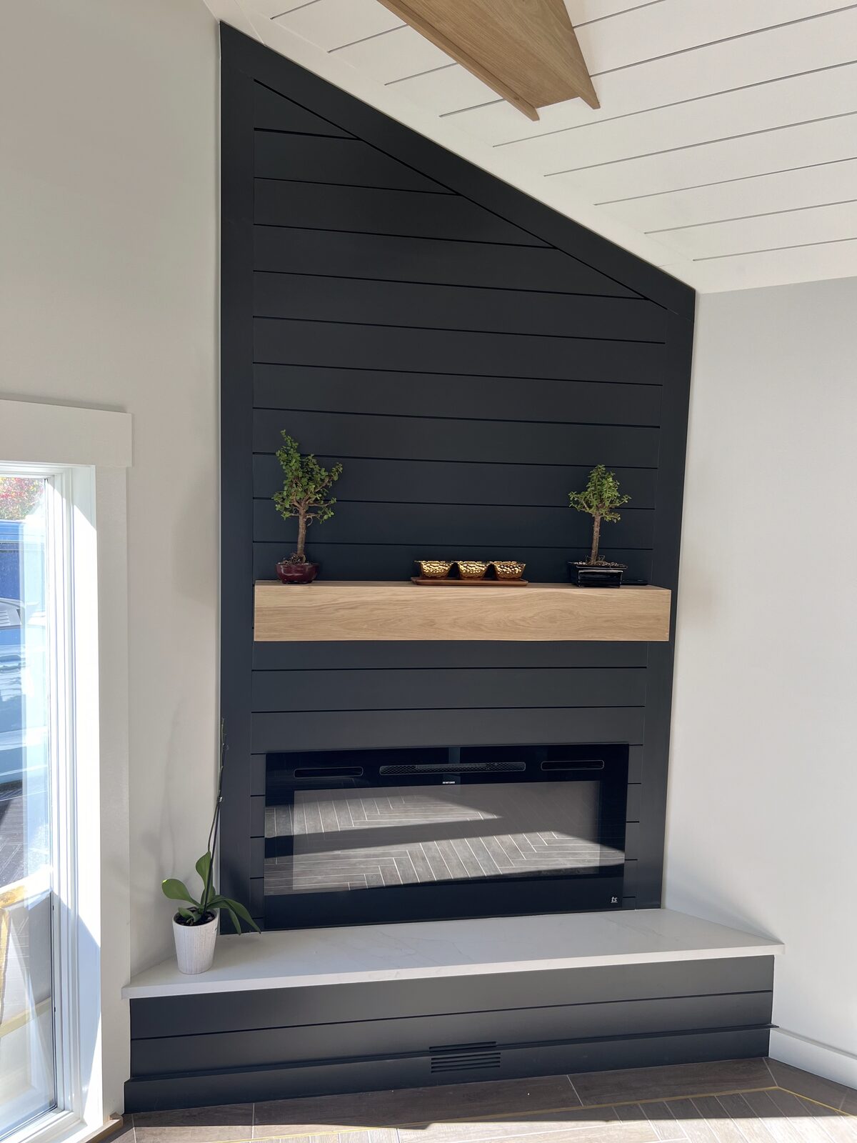 Entryway with custom millwork and staircase